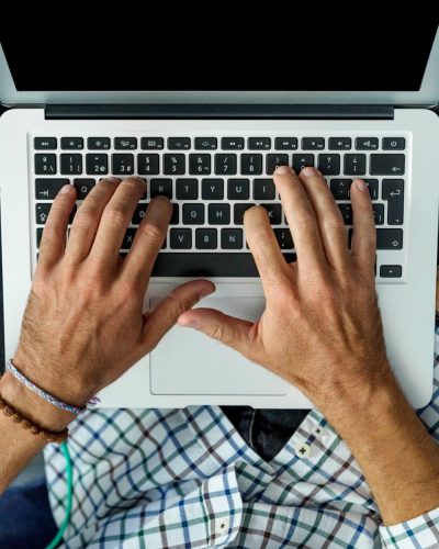 a man working on laptp